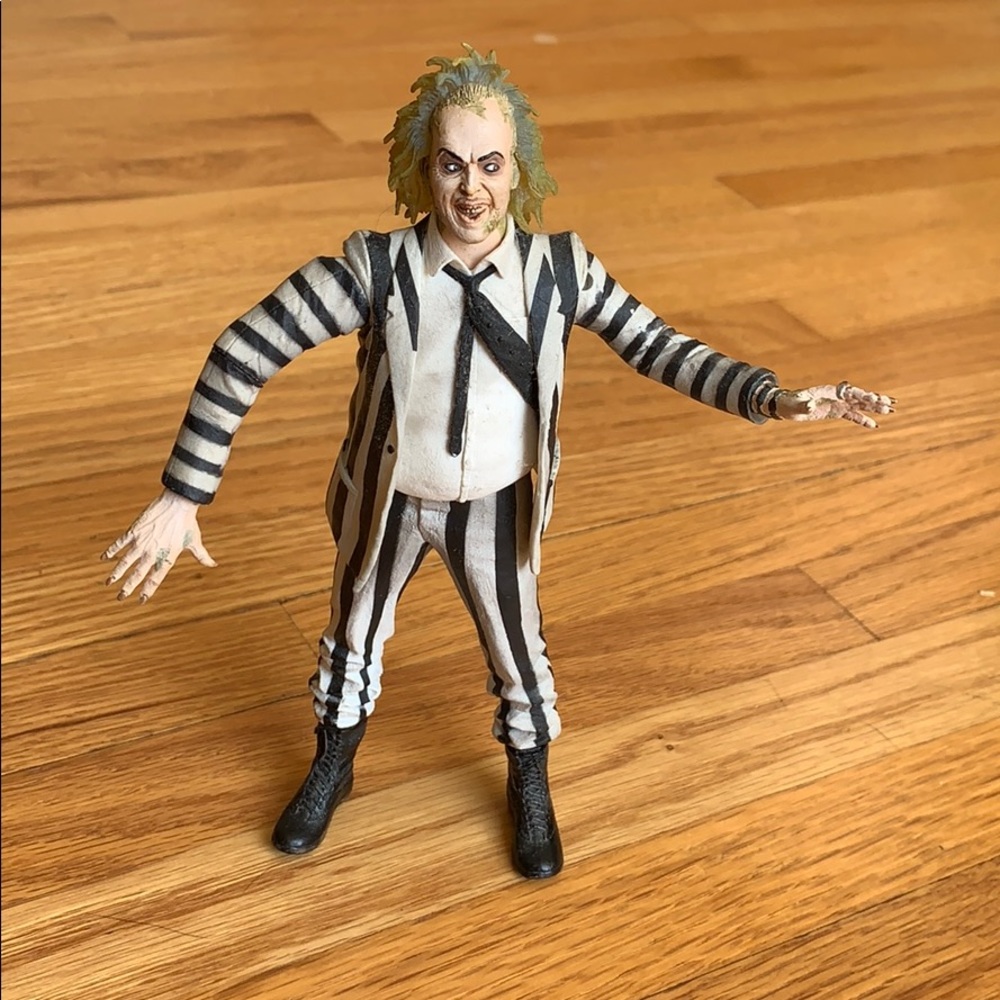 A Beetlejuice figurine.